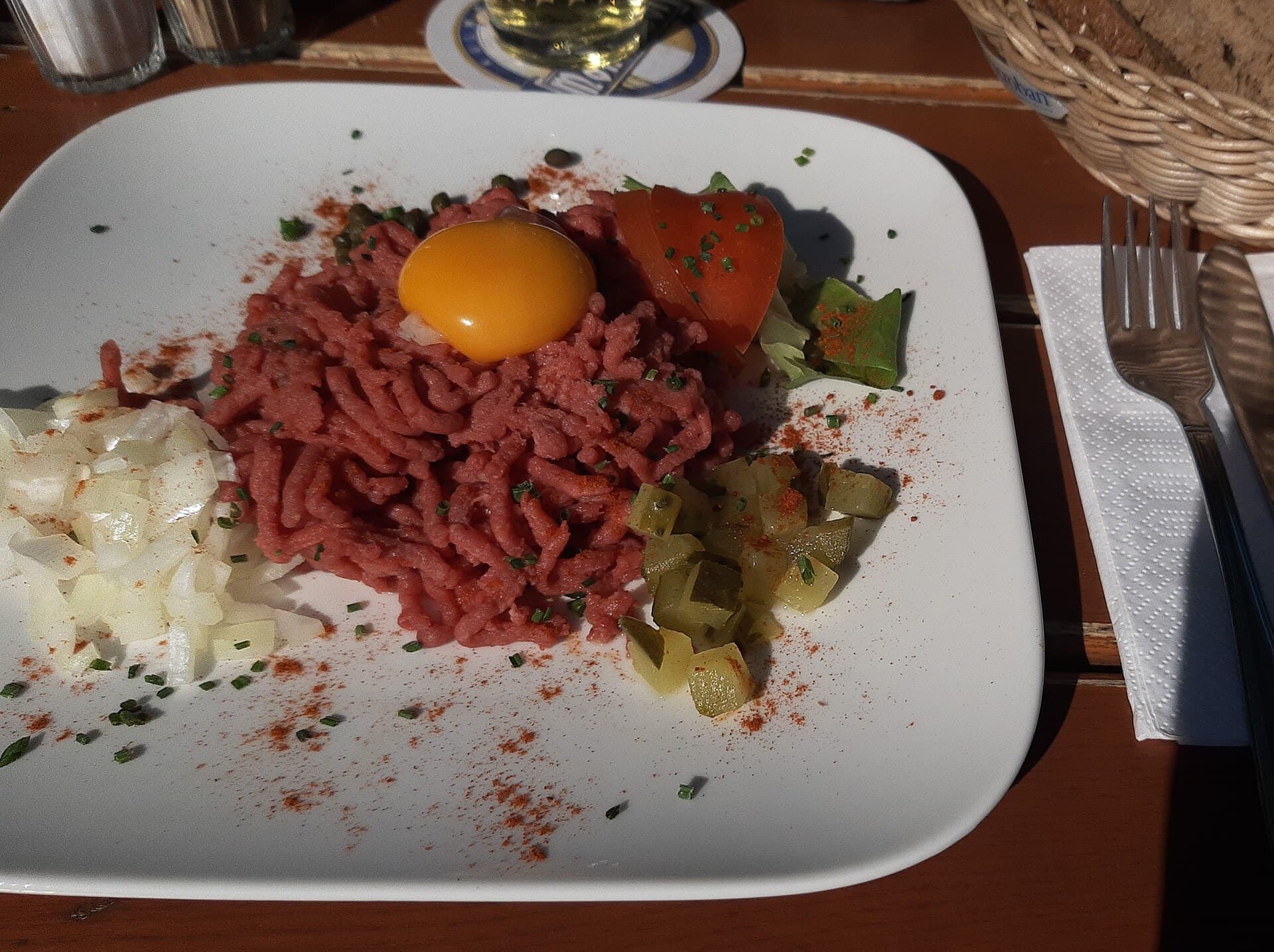 Steak tartare with a raw egg yolk