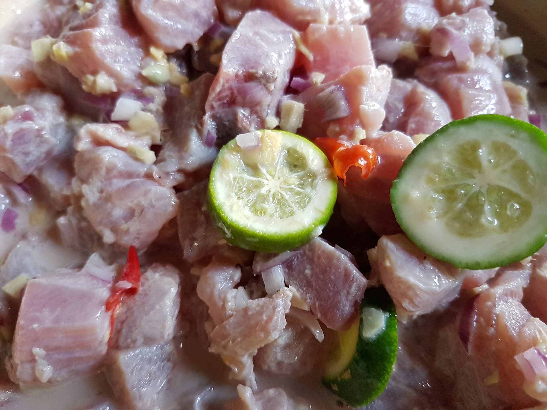 Filipino kinilaw with cucumber and calamansi