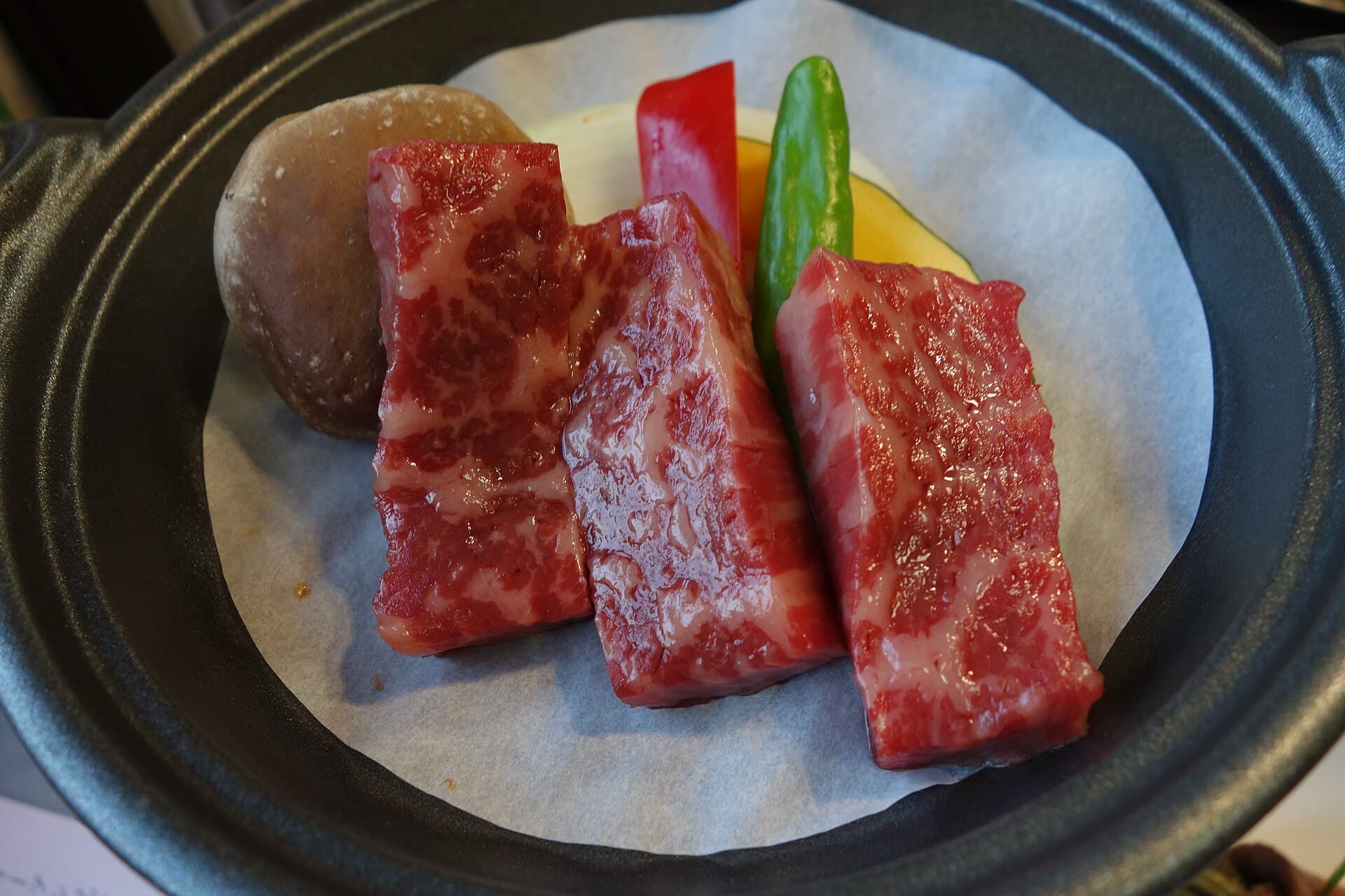 Marbled raw beef on a plate