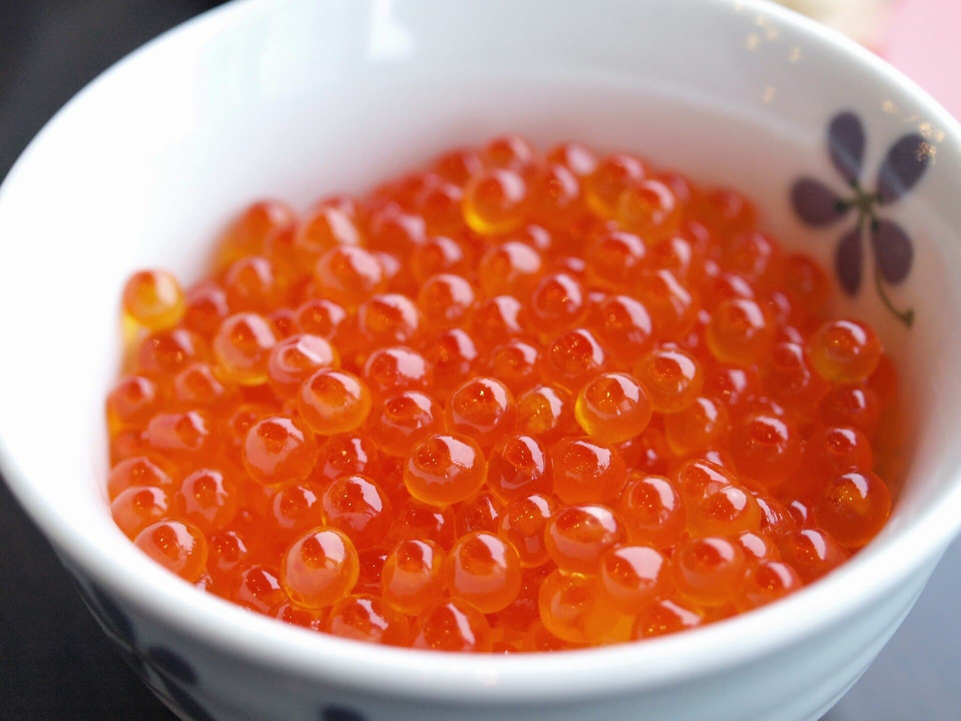 A bowl of glistening ikura (salmon roe)